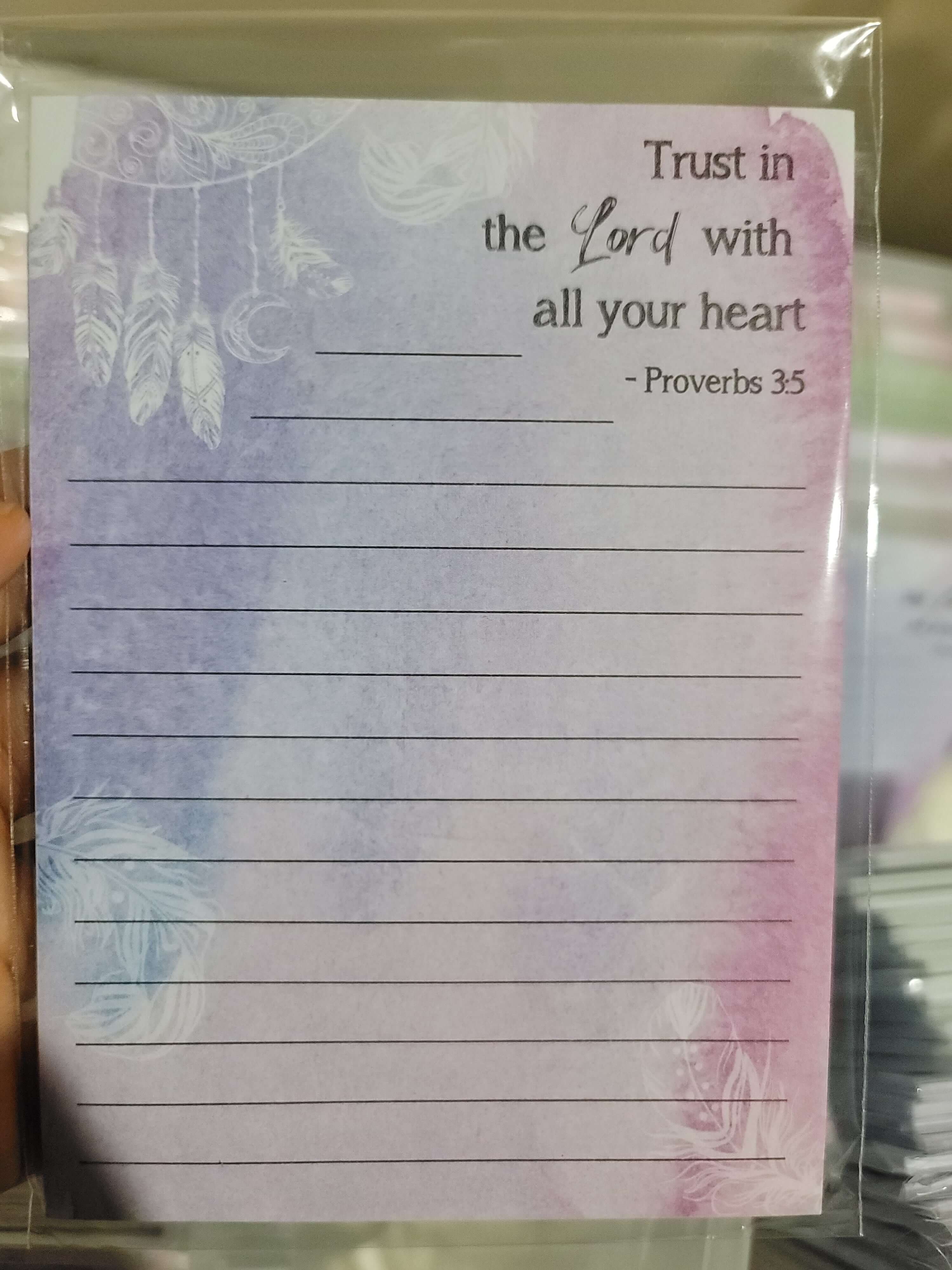 Notepad with a meaningful spiritual quote promoting mindfulness and reflection