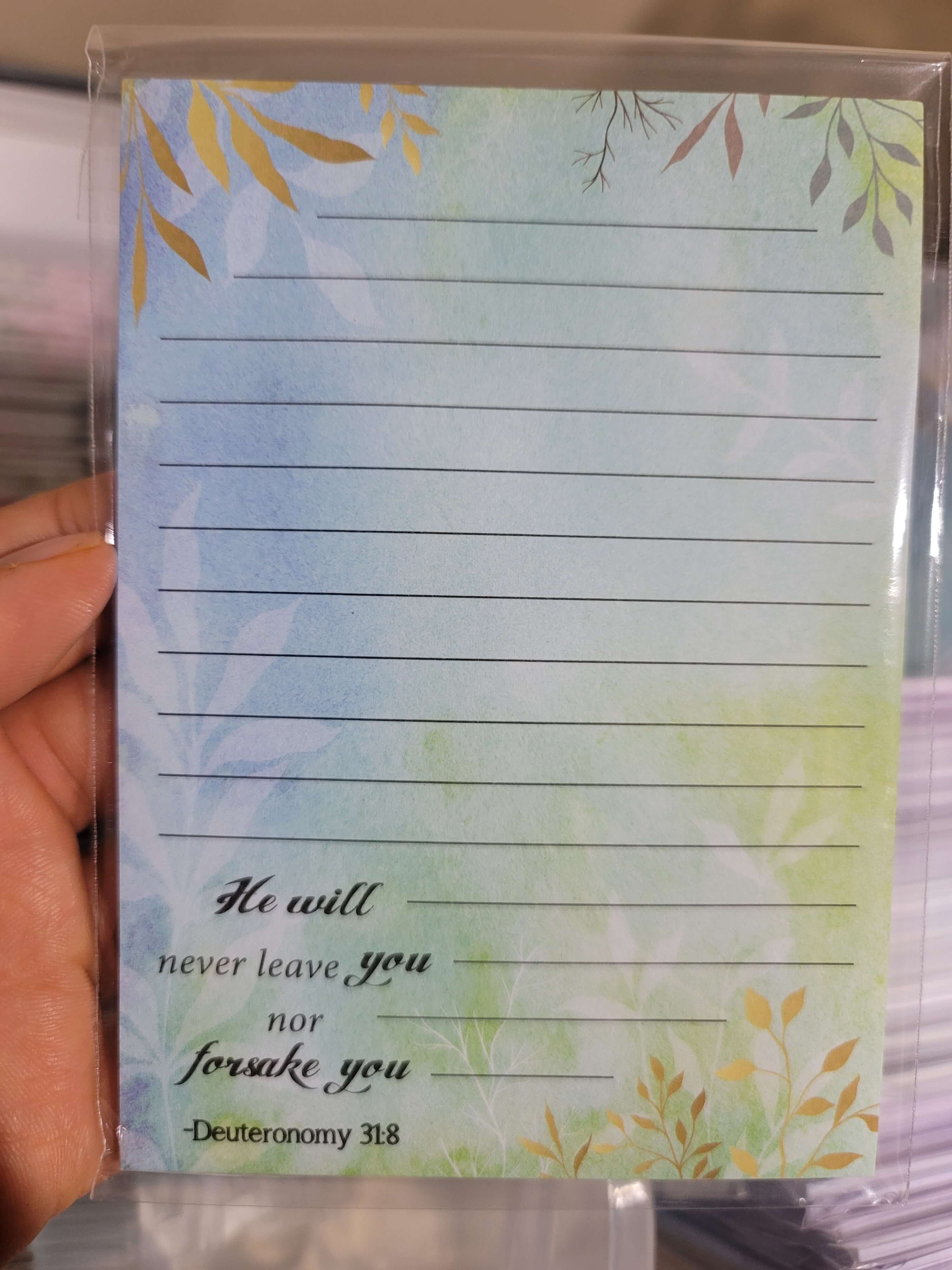 Notepad with a meaningful spiritual quote promoting mindfulness and reflection