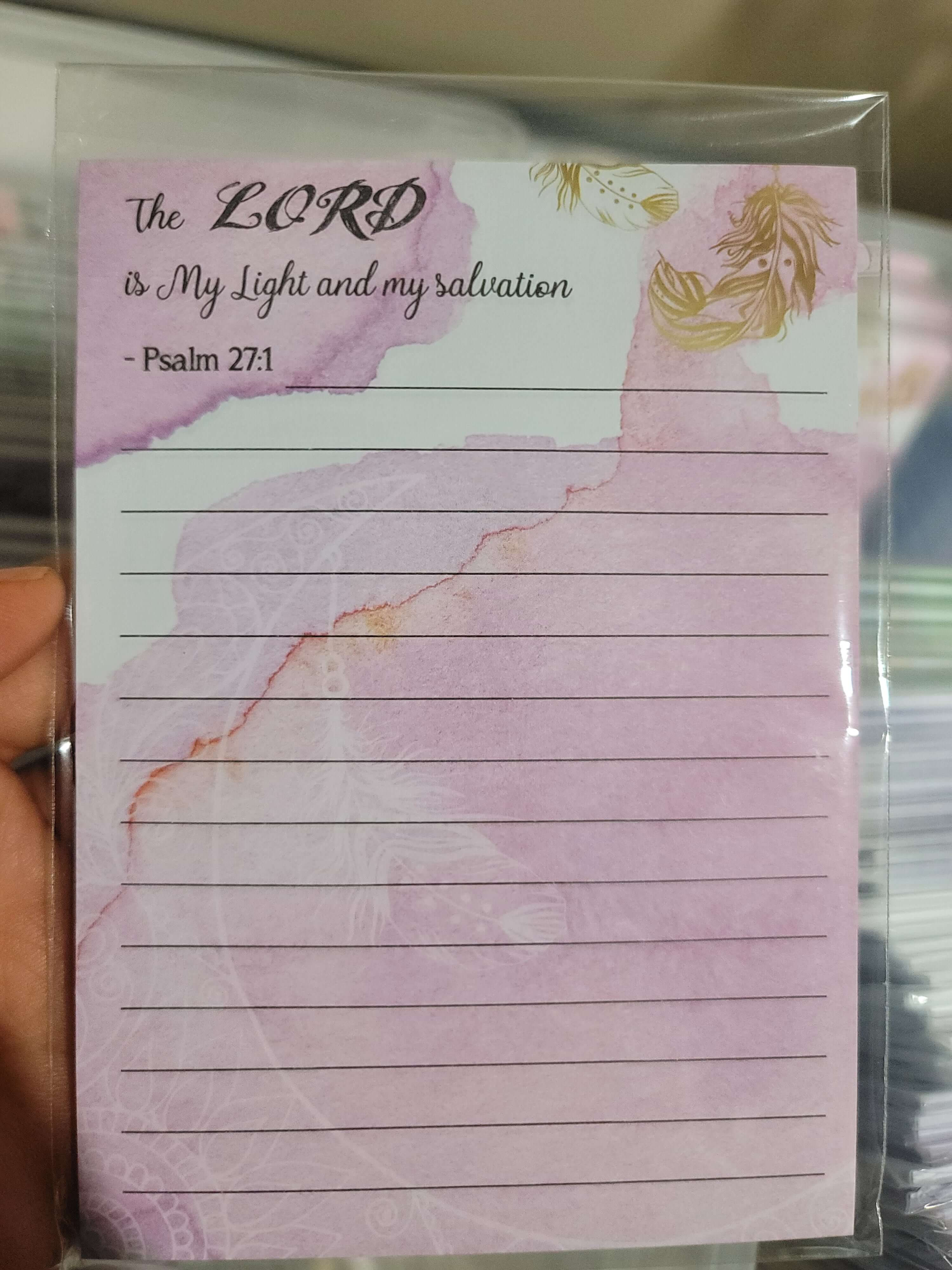 Notepad with a meaningful spiritual quote promoting mindfulness and reflection