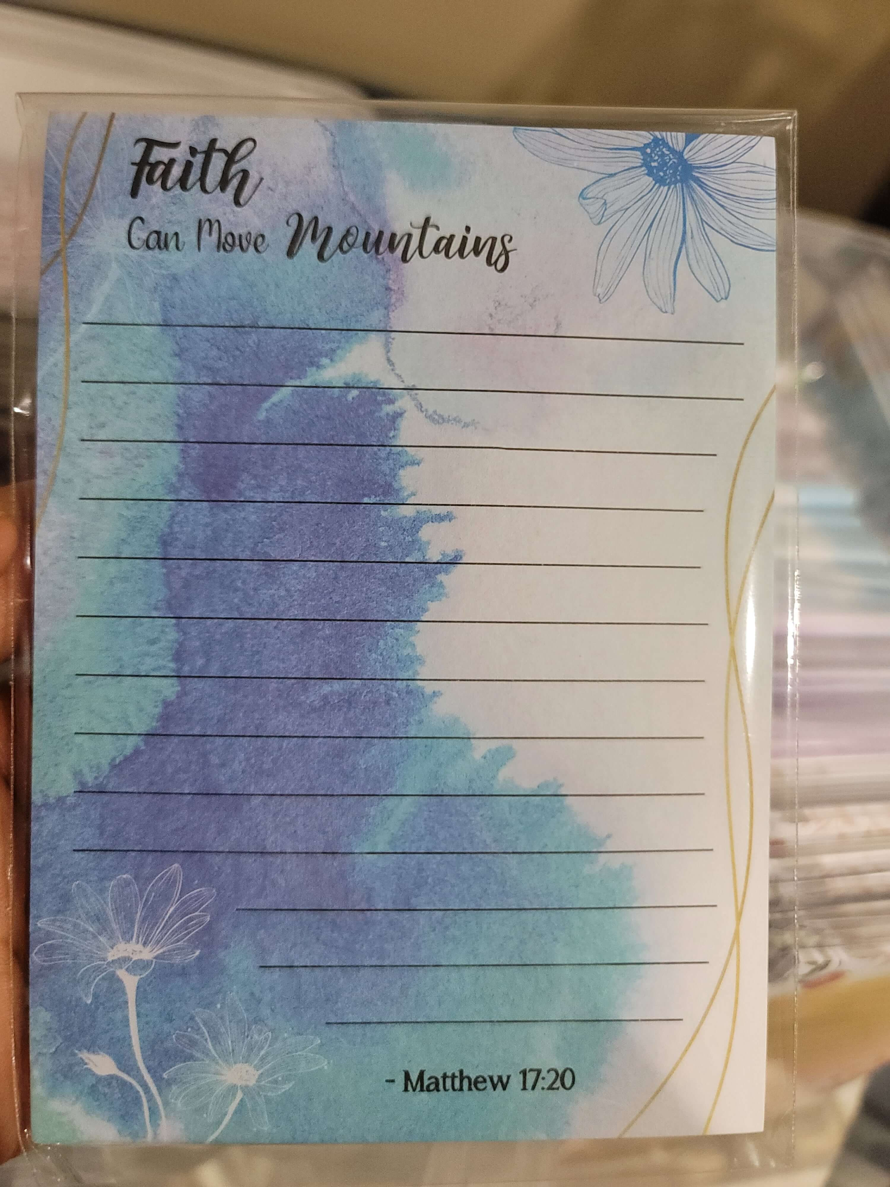 Notepad with a meaningful spiritual quote promoting mindfulness and reflection