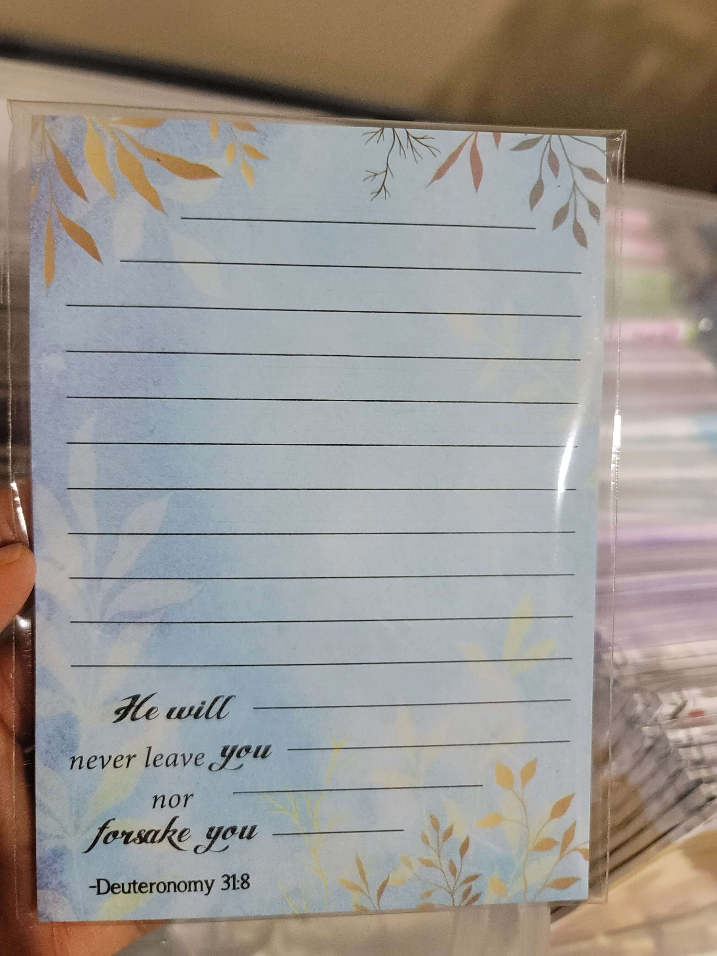 Notepad with a meaningful spiritual quote promoting mindfulness and reflection