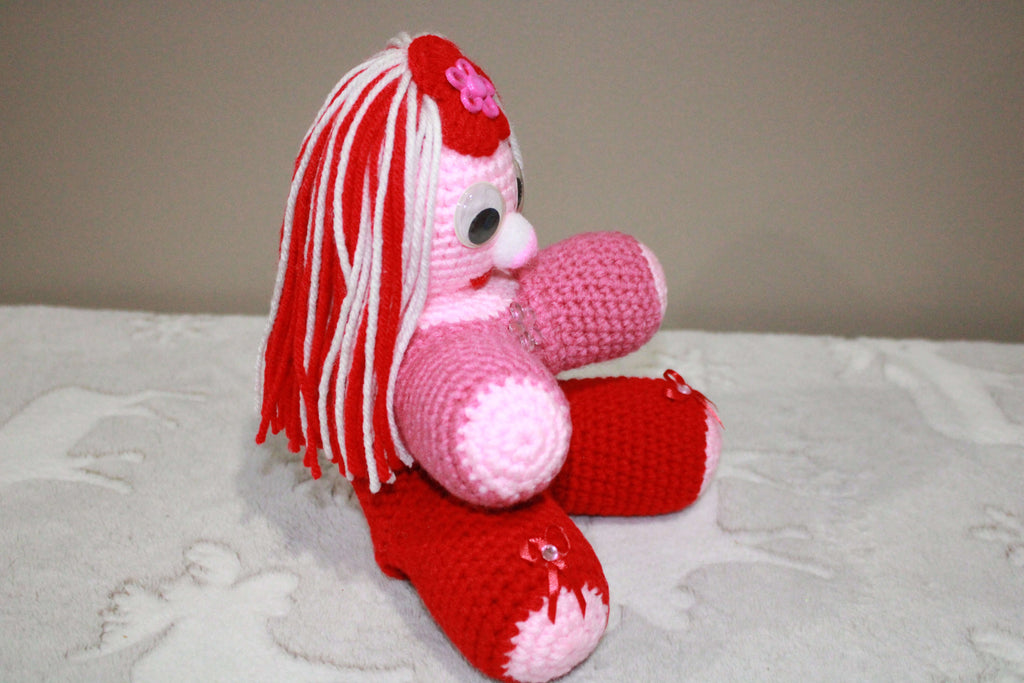Red And Pink Flower Girl crafted with handmade techniques for a truly unique style.
