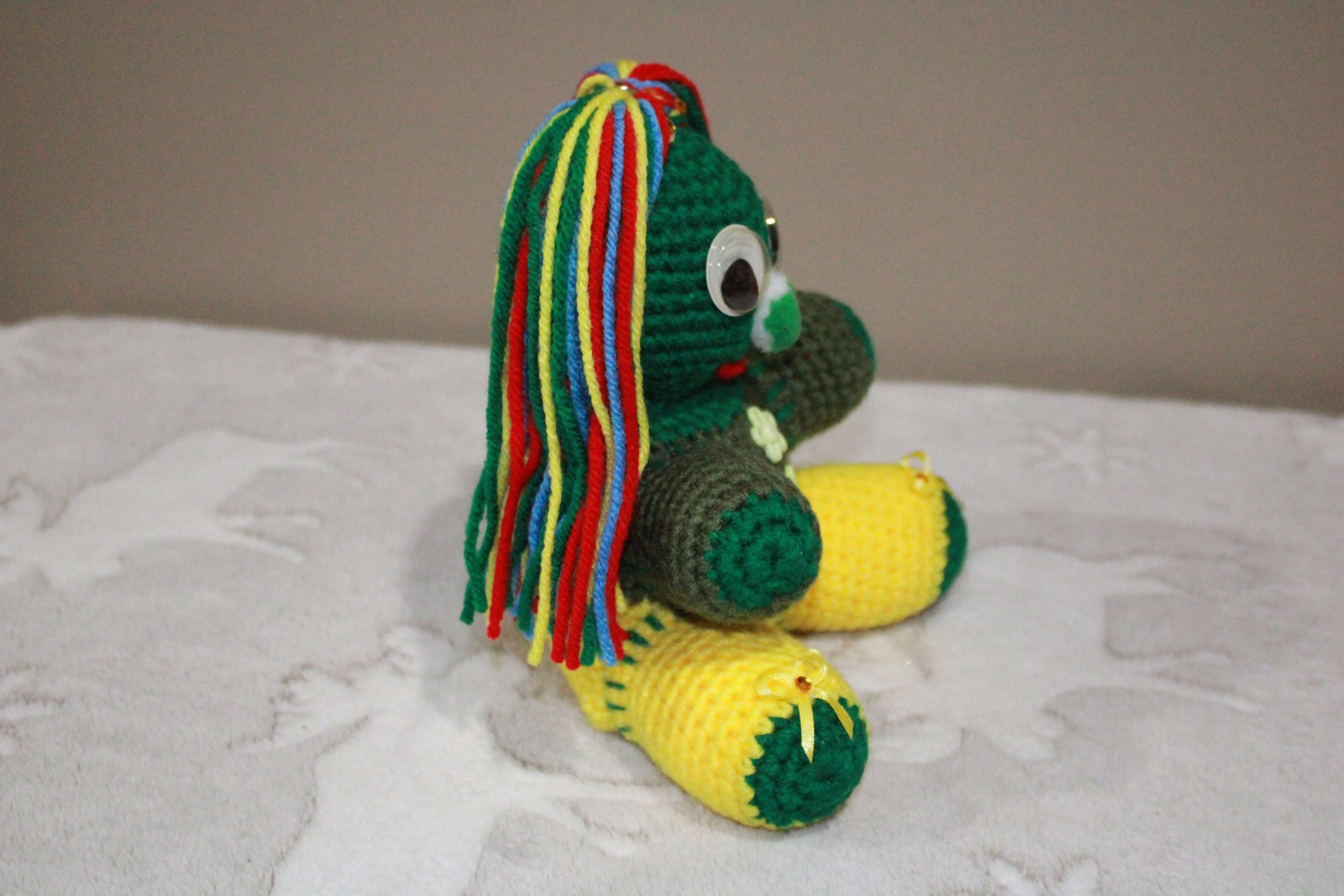 Green And Yellow Girl crafted with handmade techniques for a truly unique style.