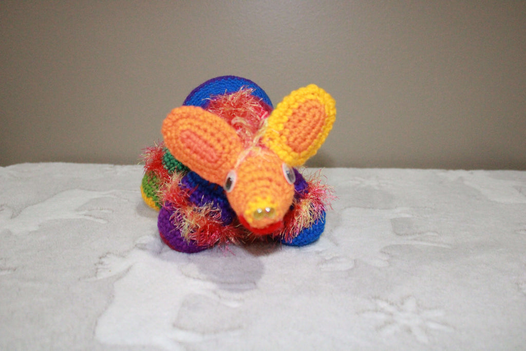 Rainbow Anteater crafted with handmade techniques for a truly unique style.