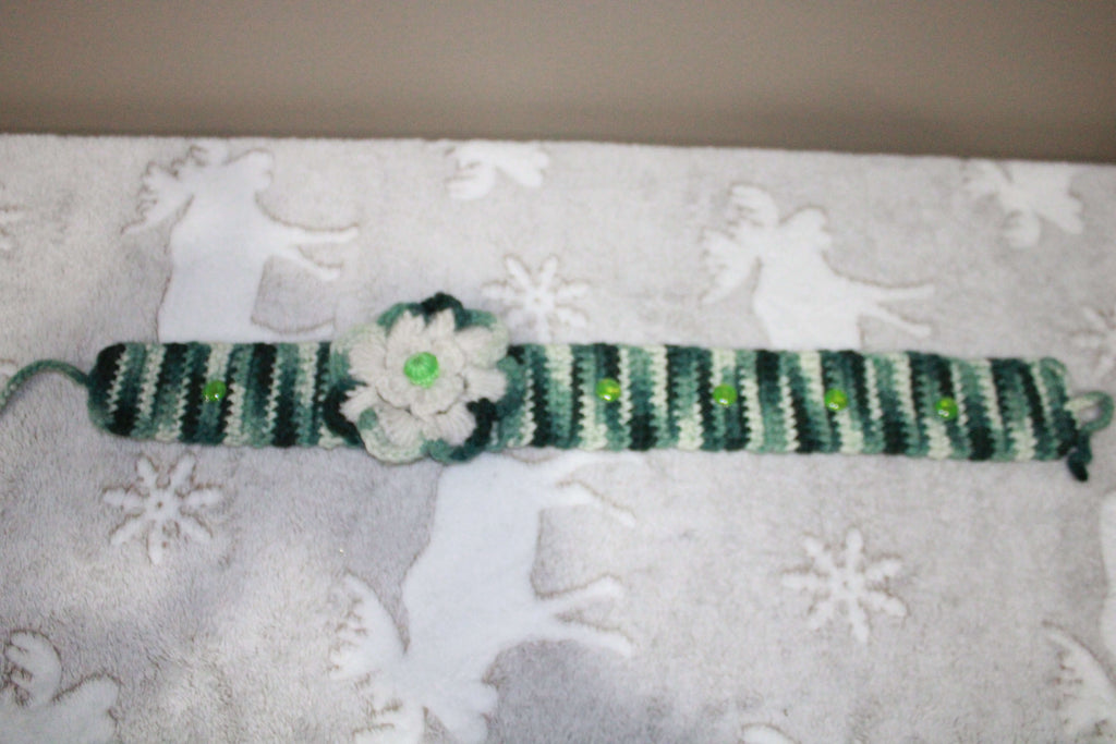 Green And White Headband Crochet Collection crafted with handmade techniques for a truly unique style.