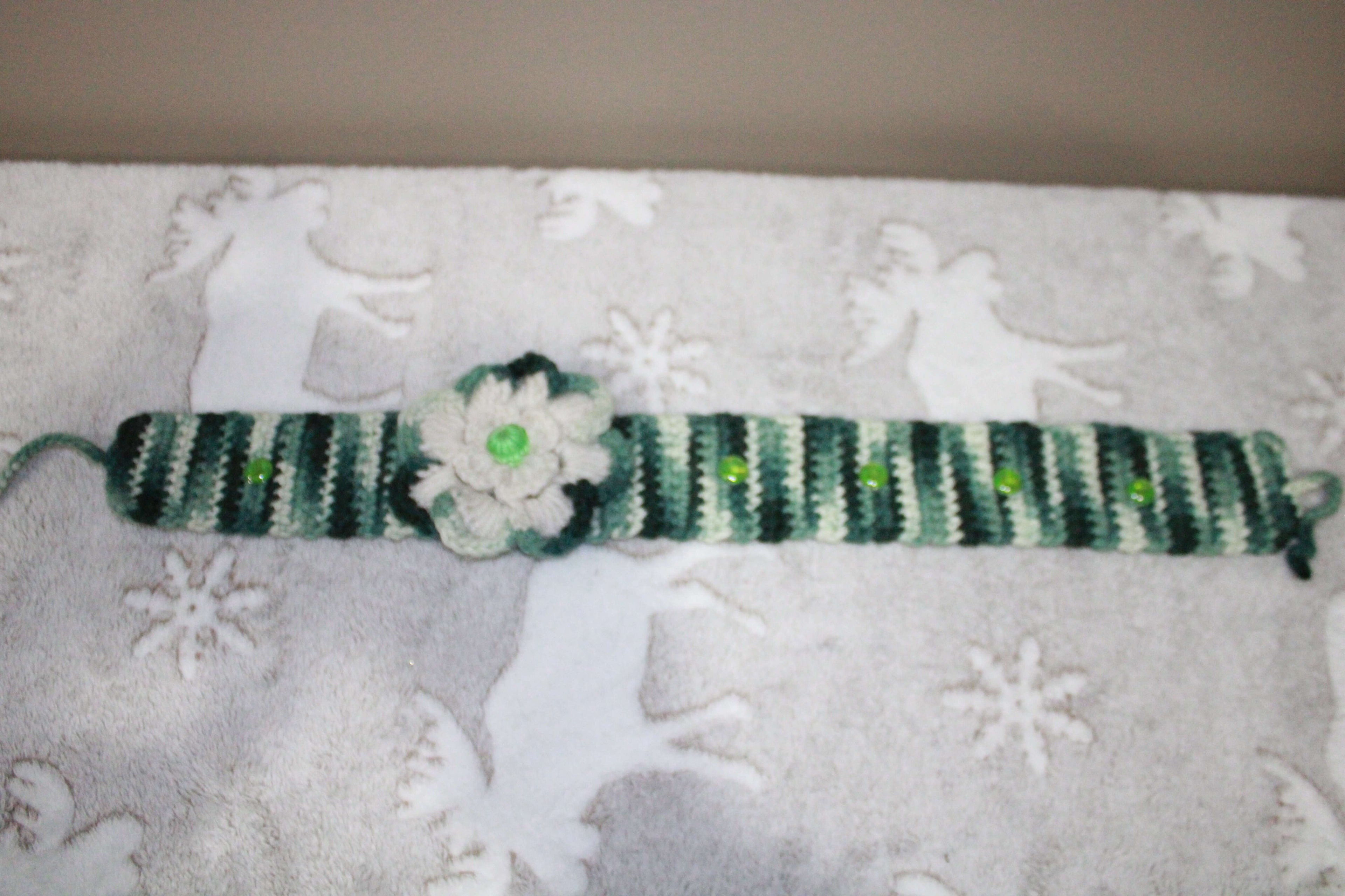 Green And White Headband Crochet Collection crafted with handmade techniques for a truly unique style.