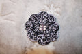 Black And Lavender Fashion Flower crafted with handmade techniques for a truly unique style.