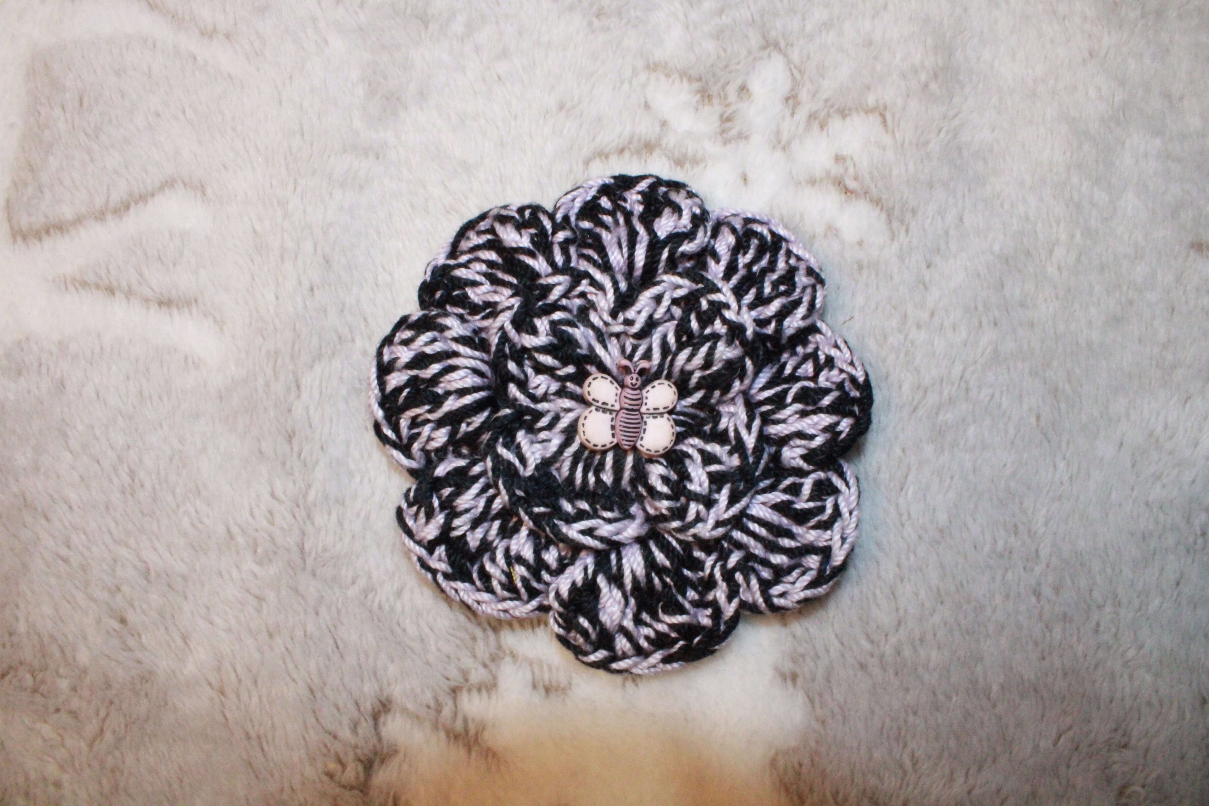 Black And Lavender Fashion Flower crafted with handmade techniques for a truly unique style.