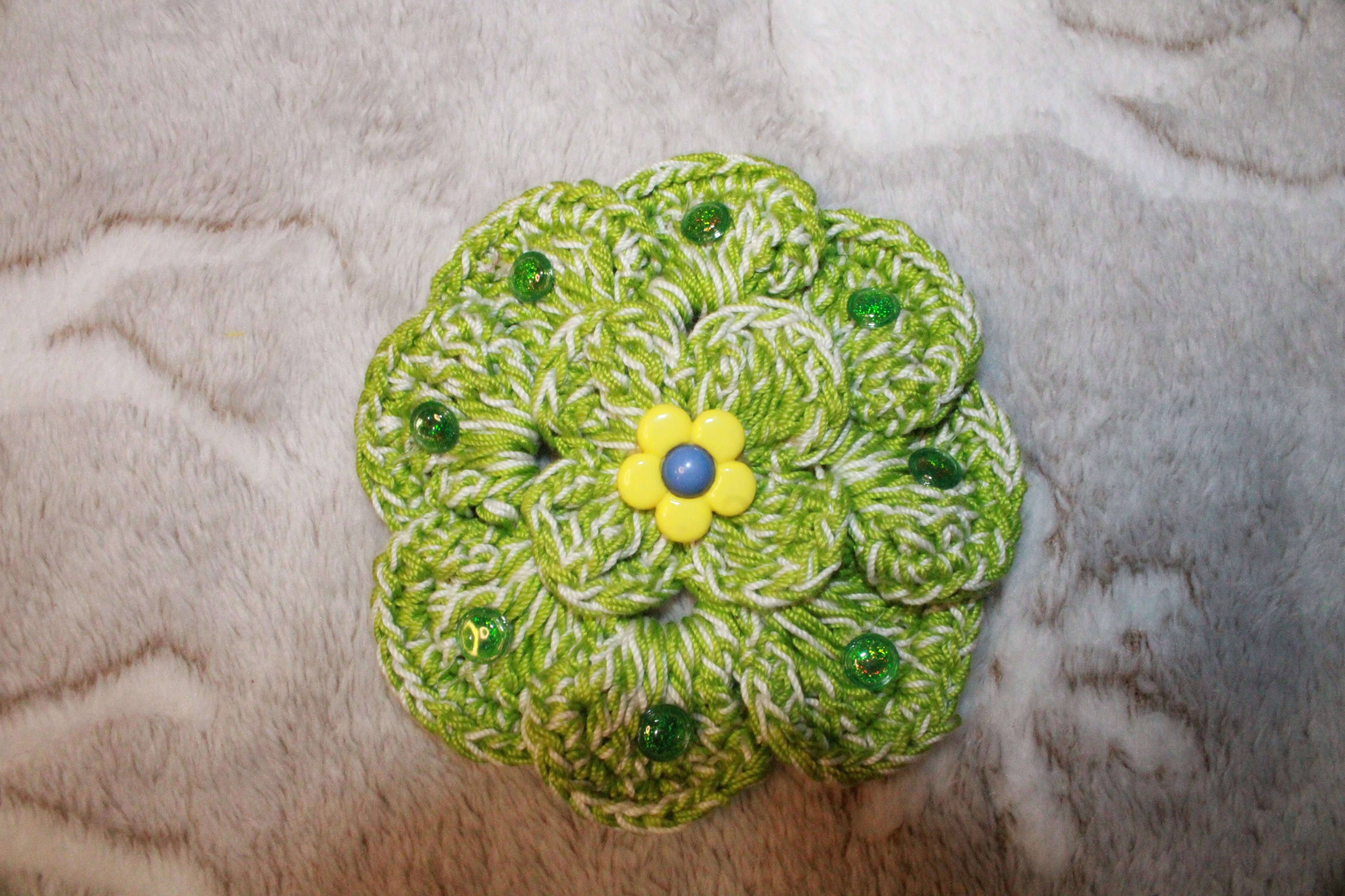 Green And White Fashion Flower crafted with handmade techniques for a truly unique style.