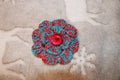 Red And Blue Fashion Hairclip Flower crafted with handmade techniques for a truly unique style.