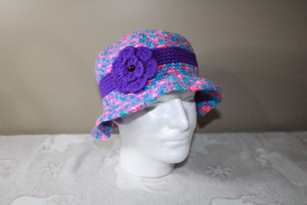 Pink/Blue With Purple Flower Crochet Cute Hat For Woman crafted with handmade techniques for a truly unique style.