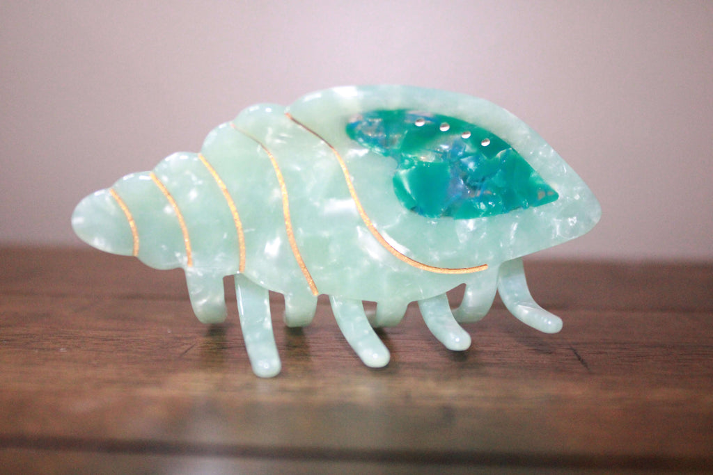 Stylish Cute Blue Caribbean Conch Shape Hair Claw Clips Strong Hold featuring unique designs, perfect for adding a touch of flair to any hairstyle.